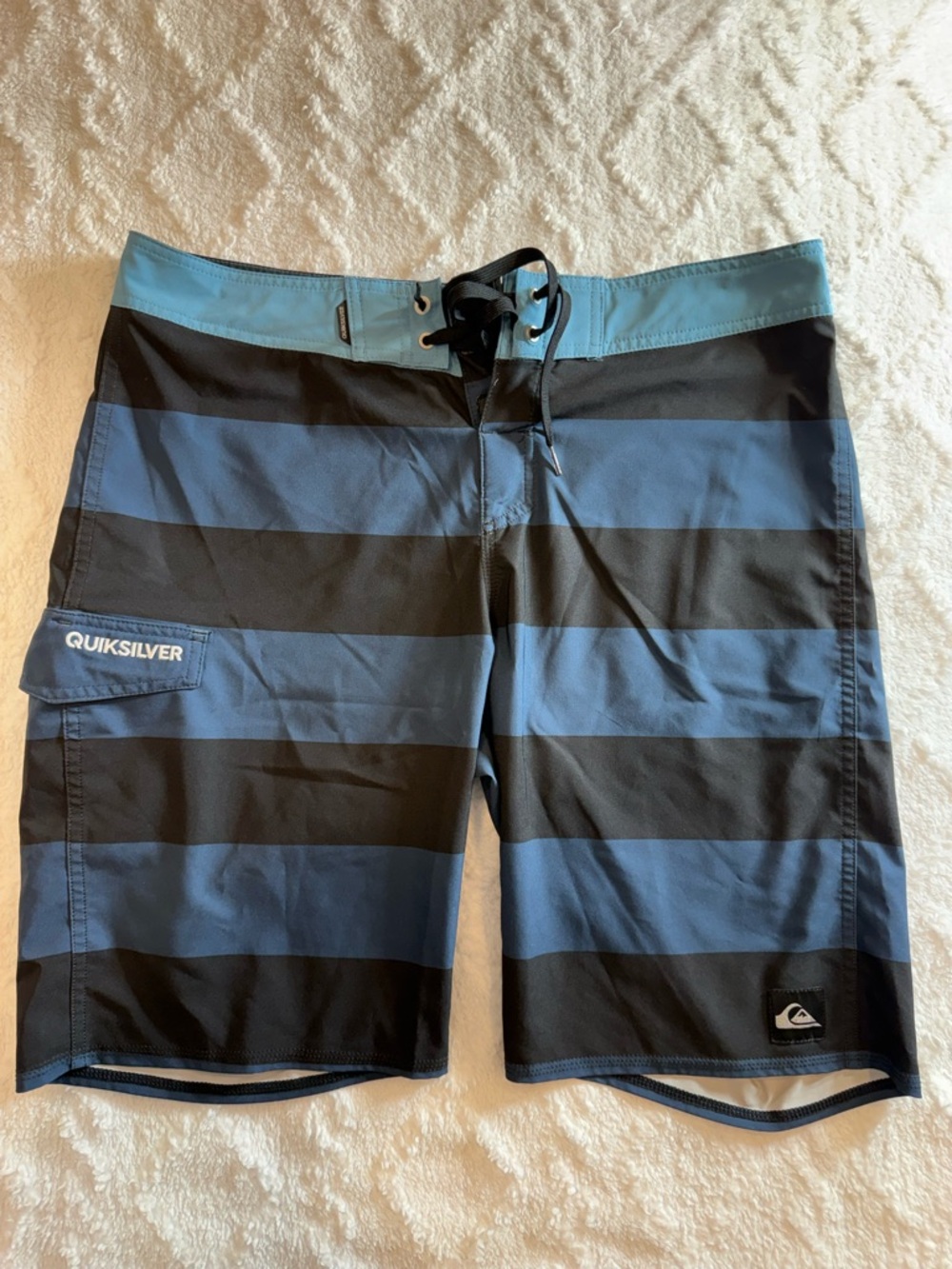 Quiksilver Men’s Blue and Black Striped Boardshorts with Teal Waistband